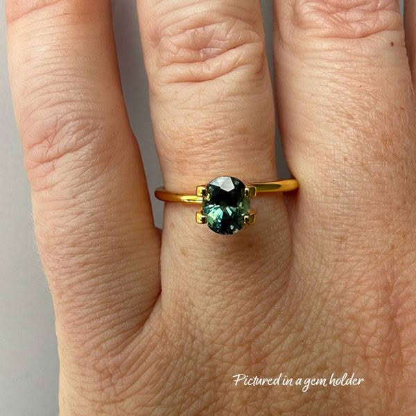 5. Green-Sapphire-stone-oval-shape-1.2 carats-C202-on hand-yellow gold