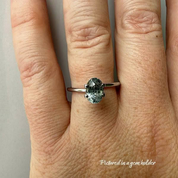 5. Green-Sapphire-stone-oval-shape-1.5 carats-C205-on hand-white gold-platinum
