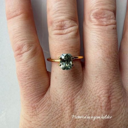 5. Green-Sapphire-stone-rectangle-shape-1.8 carats-B132-on hand-yellow gold